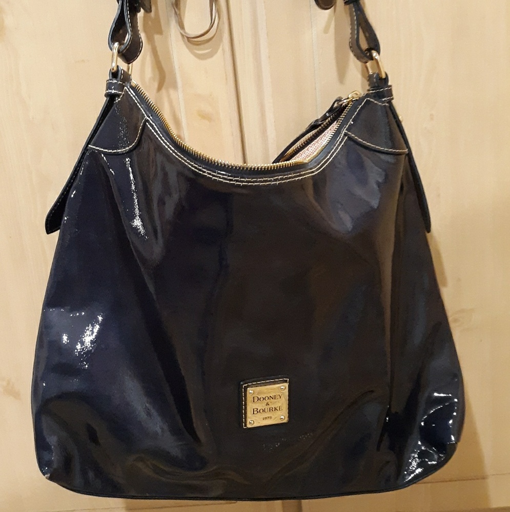 Dooney & Burke Patent Leather Navy Blue Hobo Bag.
